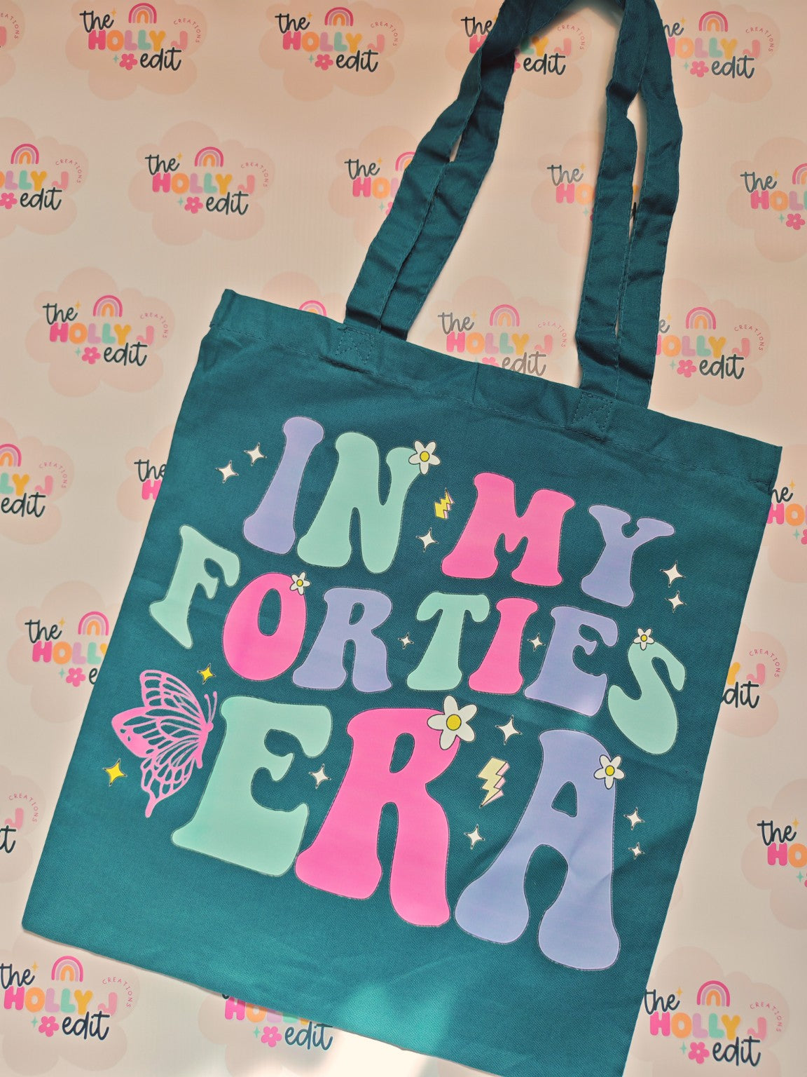 Teal cotton tote bag with colourful In My Forties Era design