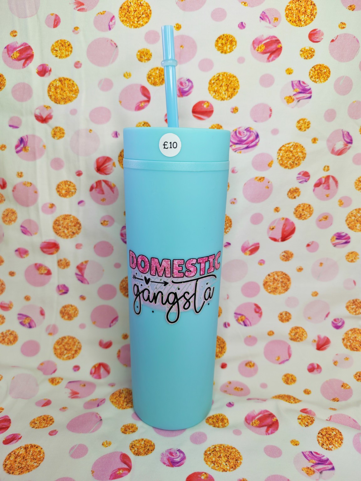 Blue 16oz skinny tumbler with Domestic Gangsta design and straw