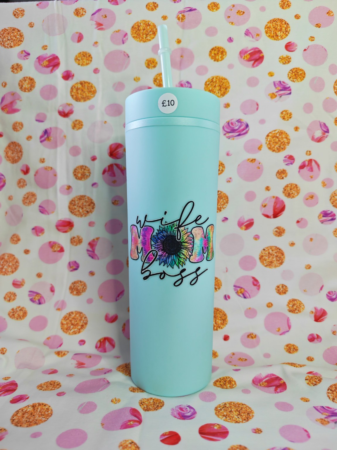 Aqua 16oz skinny tumbler with colourful Happy Days design and straw