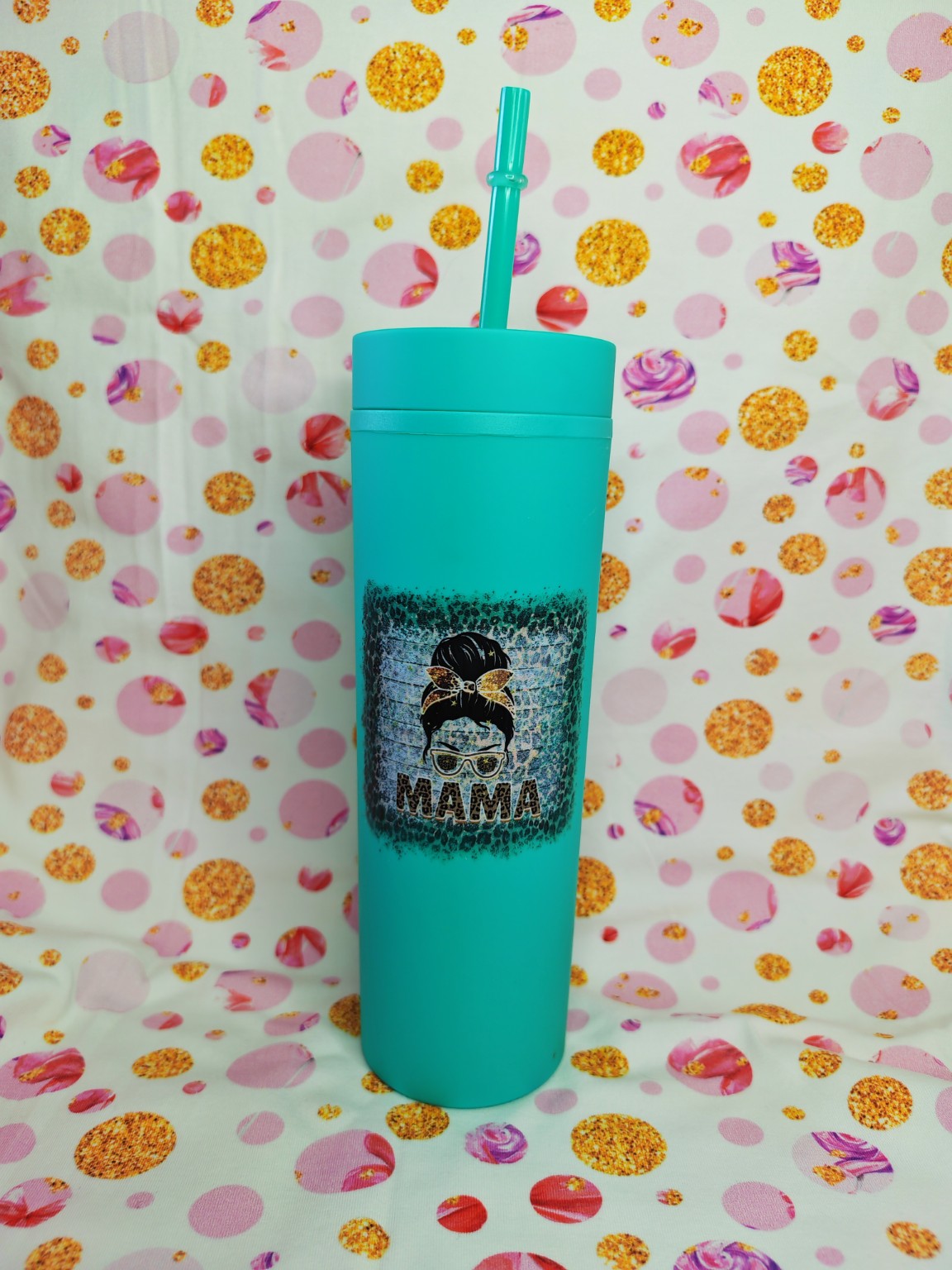 Turquoise 16oz skinny tumbler with Mama design and bun hairstyle