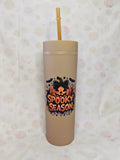 Neutral beige 16oz skinny tumbler with spooky season pumpkin and bow design