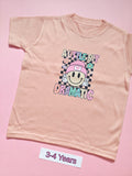 Pink children's T-shirt with colourful A Little Bit Dramatic smiley design, size 3-4 years