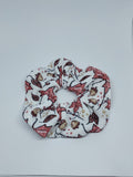 Handmade white scrunchie with autumn leaf print