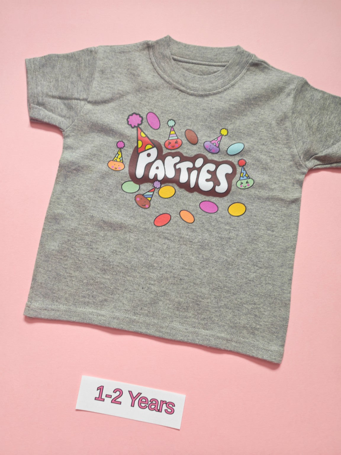Grey children's T-shirt with colourful birthday parties design, size 1-2 years