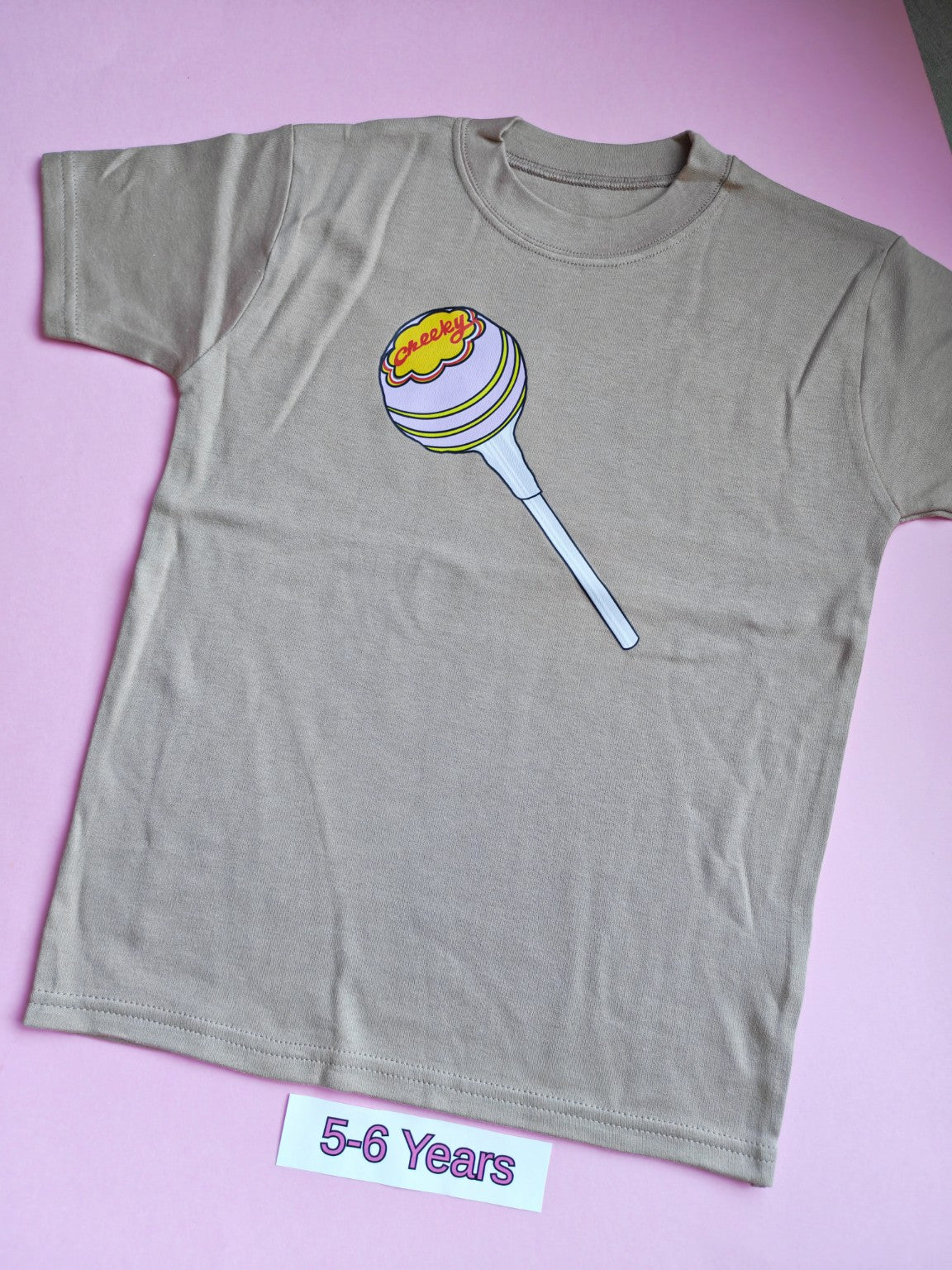 Taupe children's t-shirt with colourful Cheeky lollipop design, 5-6 years