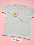 White children's T-shirt with pastel pink Cheeky lollipop design, size 3-4 years