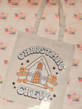 Natural cotton tote bag with Christmas Crew gingerbread house and gingerbread characters design
