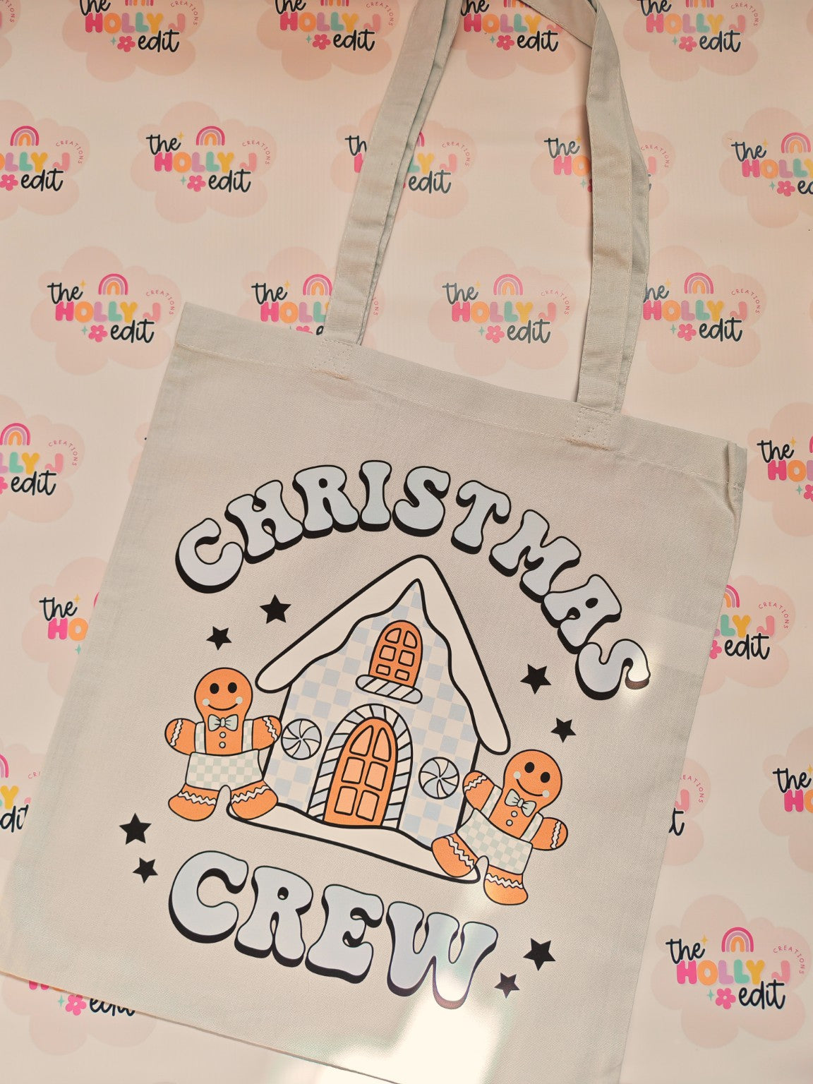 Natural cotton tote bag with Christmas Crew gingerbread house and gingerbread characters design