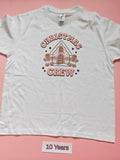 White children's Christmas T-shirt with Christmas Crew gingerbread house design, size 10 years