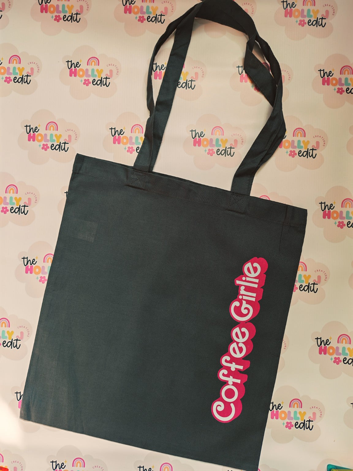 Black cotton tote bag with pink Coffee Girl design