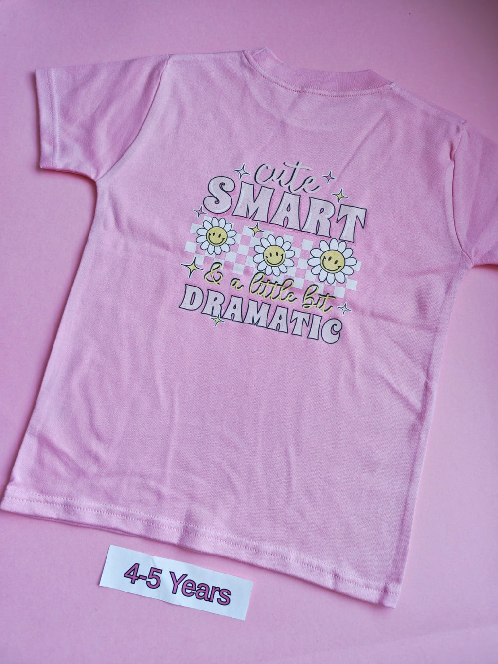 Pink children's t-shirt, 4-5 years, cute smart and a little bit dramatic daisy design, back view