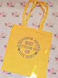 Yellow cotton tote bag with colourful floral Doing My Best Letting Go Of The Rest design