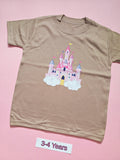 Taupe children's T-shirt with pastel pink fairytale castle design, size 3-4 years