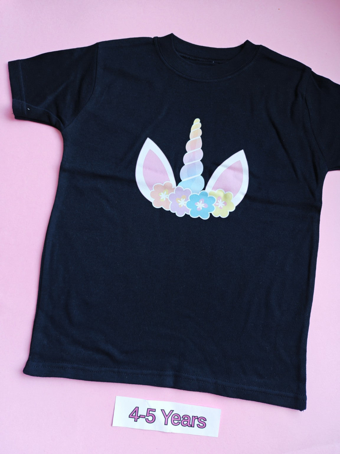 Black children's t-shirt, 4-5 years, pastel unicorn horn and floral design