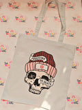 Natural cotton tote bag with skull wearing a winter hat and scarf with Freezing to Death design