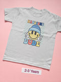 White children's T-shirt with colourful Handsome Dude smiley design, size 2-3 years