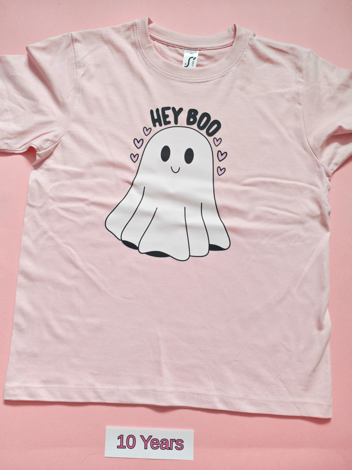 Pale pink children's Halloween T-shirt with cute Hey Boo ghost design, size 10 years