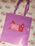 Purple cotton tote bag with Hot Mess Express Admit One ticket design