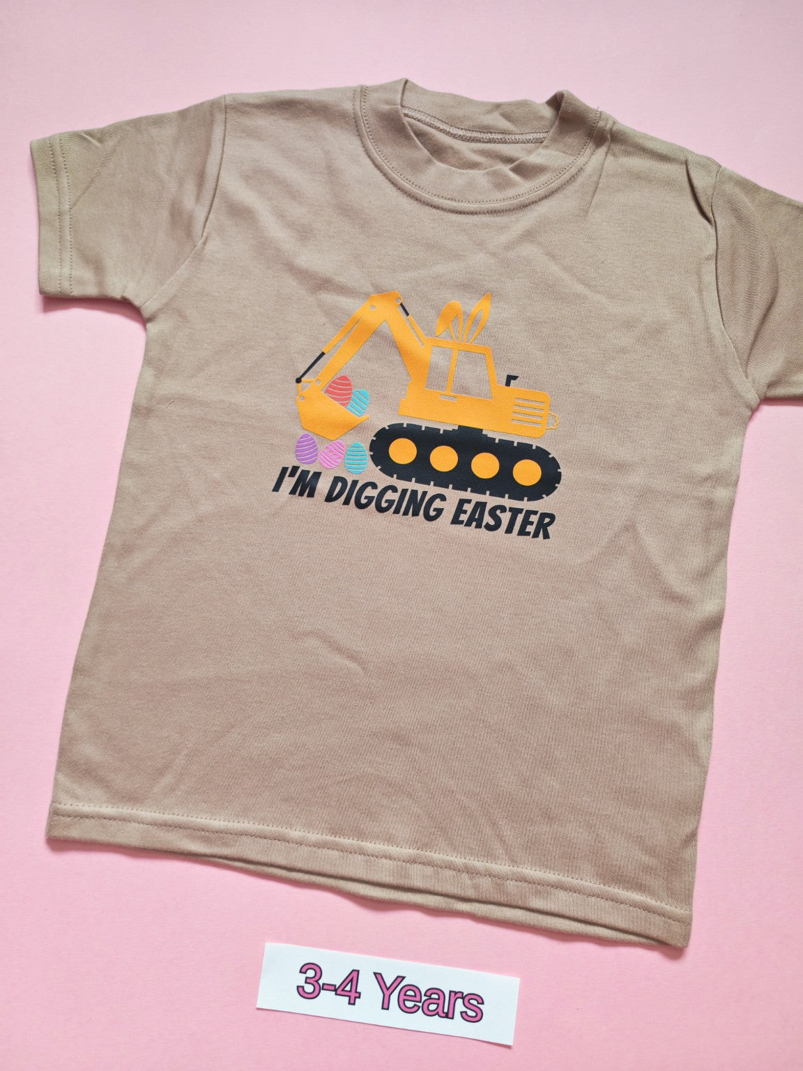 Taupe children's T-shirt with orange digger and colourful Easter eggs, I'm Digging Easter design, size 3-4 years