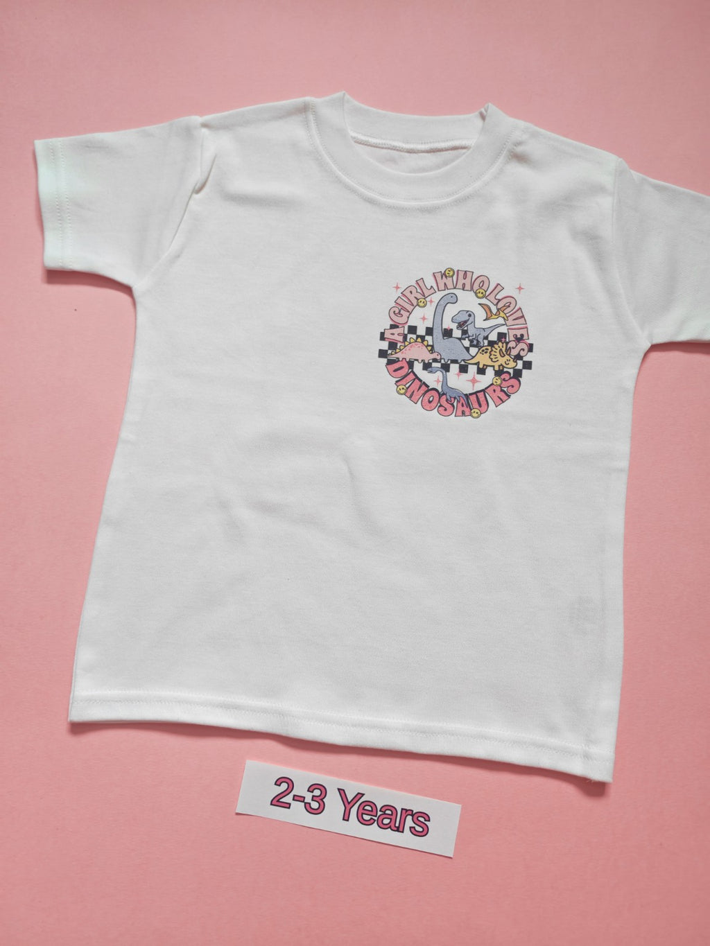White children's dinosaur T-shirt with pink Just a Boy Who Loves Dinosaurs design, size 2-3 years, front
