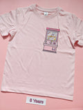 Pale pink children's T-shirt with Kindness claw machine design, size 8 years