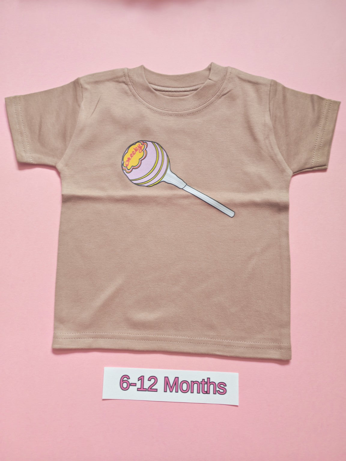 Taupe children's T-shirt with pastel lollipop design, size 6-12 months