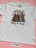 White children's Christmas t-shirt with leopard print Christmas trees and Merry & Bright design, size 12 years