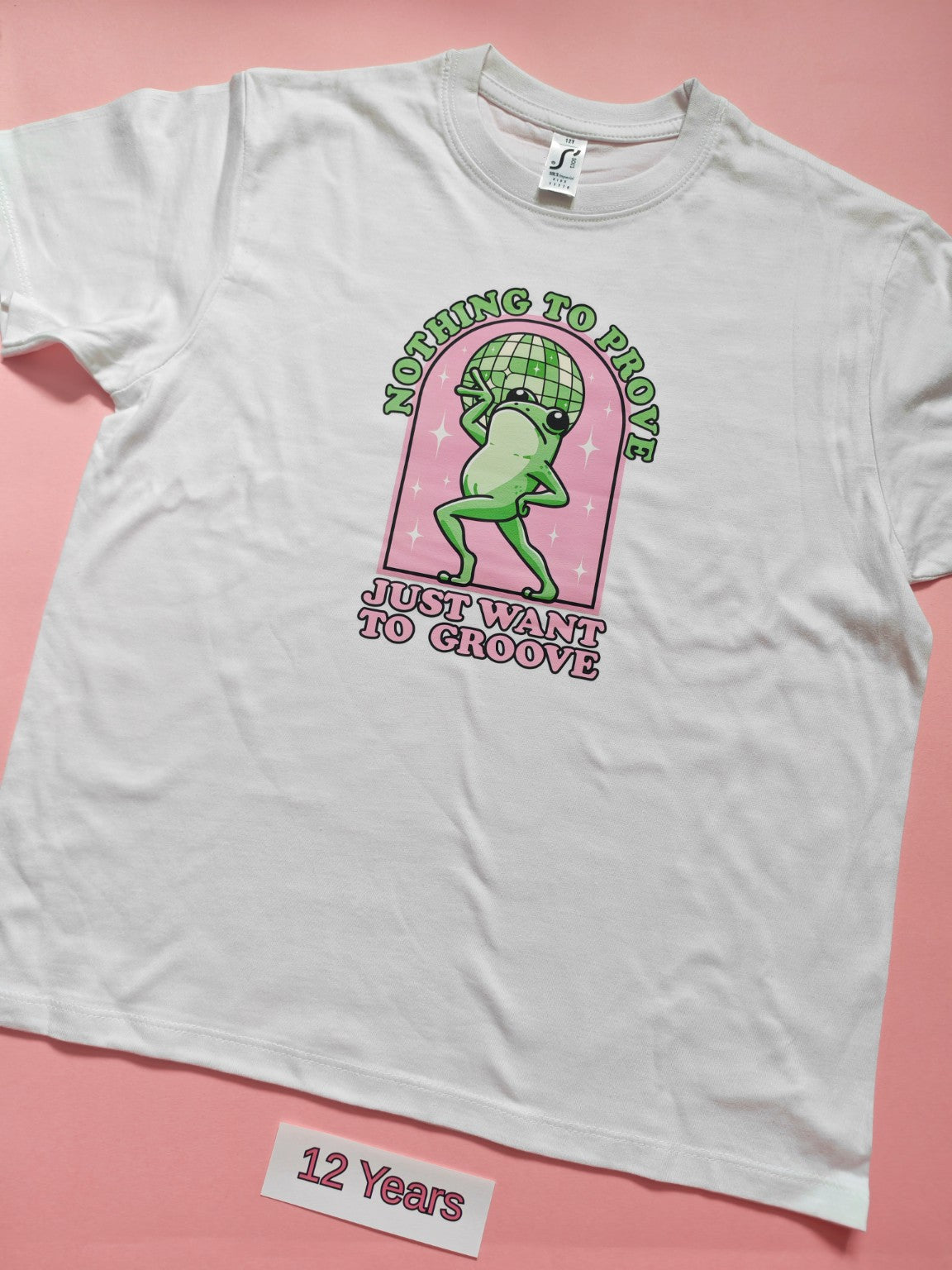 White children's T-shirt with Nothing To Prove Just Want To Groove frog design, size 12 years
