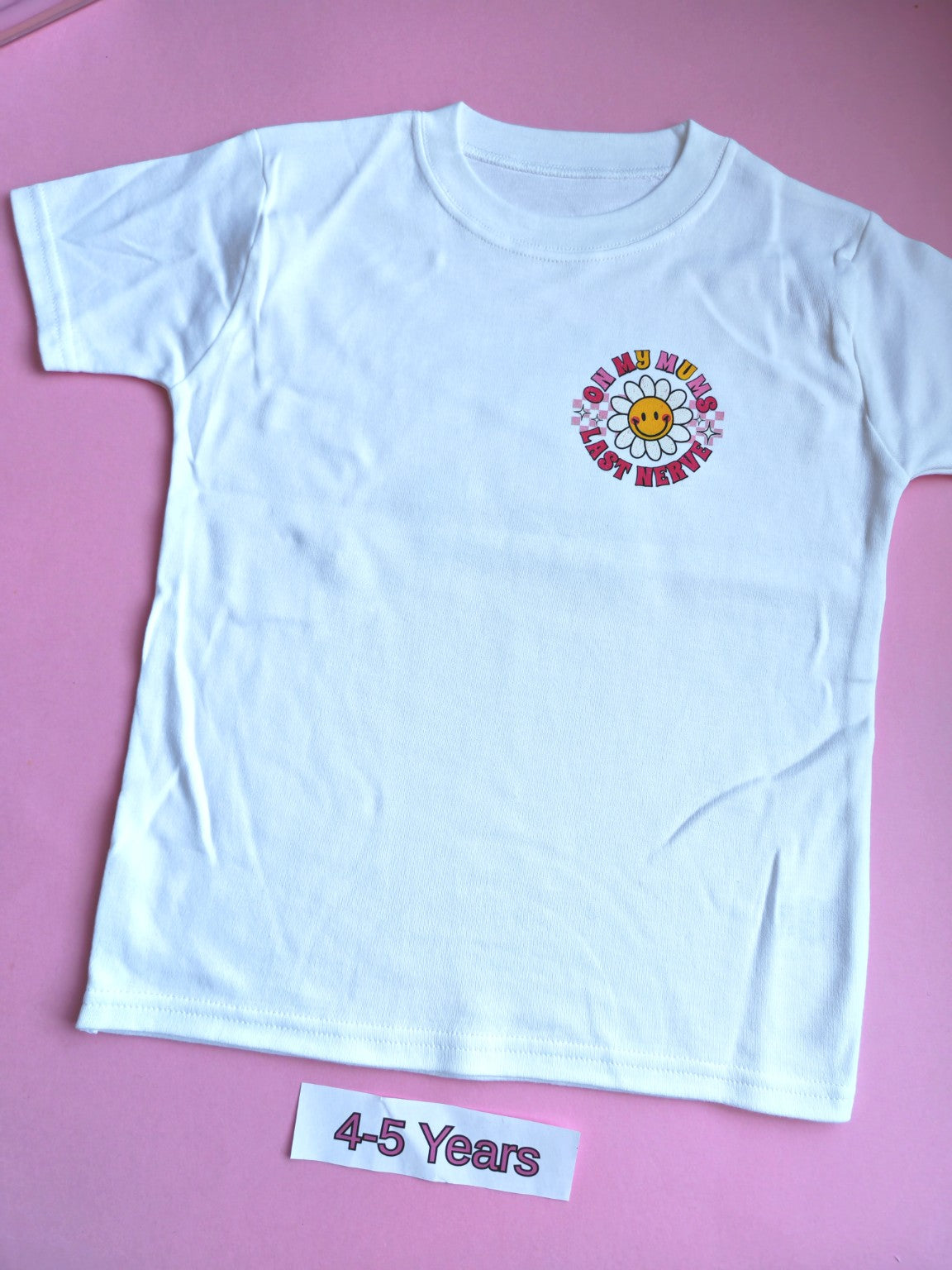 White children's t-shirt with colourful On My Mum's Last Nerve daisy design, 4-5 years, front