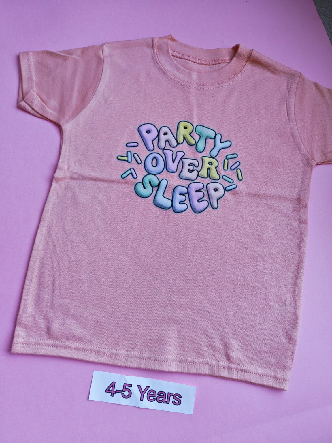 Peach children's t-shirt, 4-5 years, colourful Party Pooper design