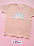 Pastel pink children's T-shirt with soft pastel rainbow design, size 3-4 years
