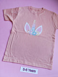 Peach children's t-shirt with pastel unicorn horn and floral design, 5-6 years