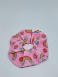 Pink handmade scrunchie with rainbow and daisy print