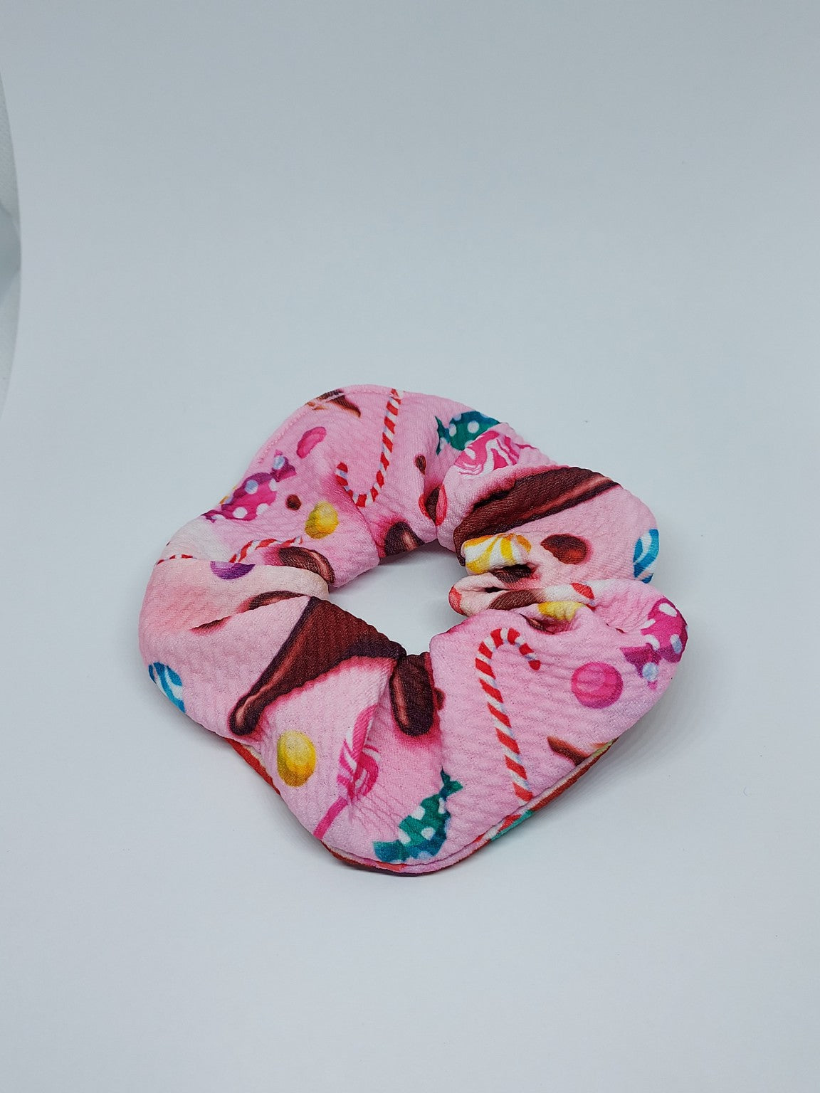 Pink handmade scrunchie with colourful sweets and candy print