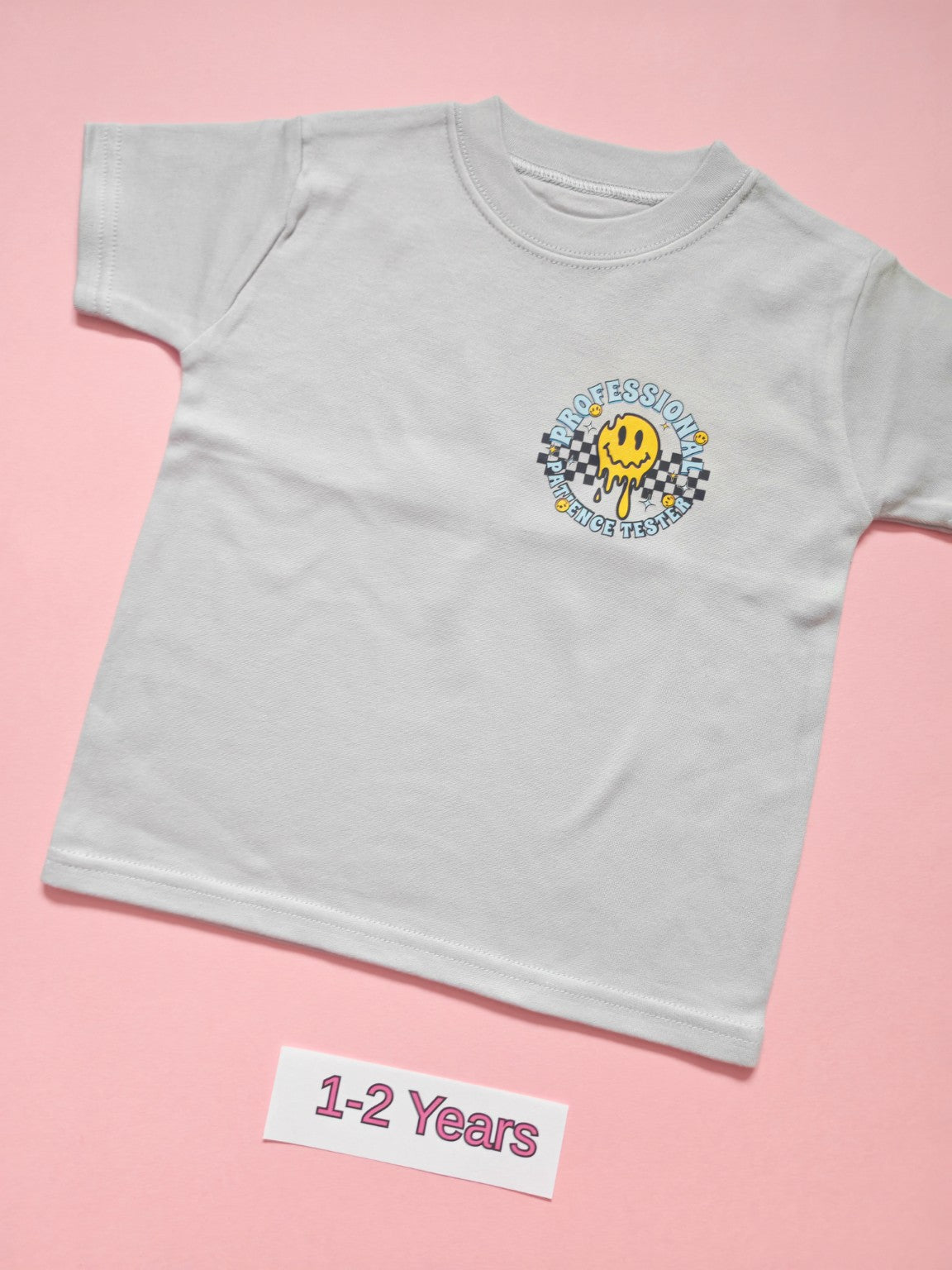 Frozen Grey children's T-shirt with Professional Patience Tester smiley design, size 1-2 years, front