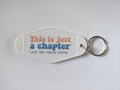 This Is Just A Chapter Motel Keychain - White