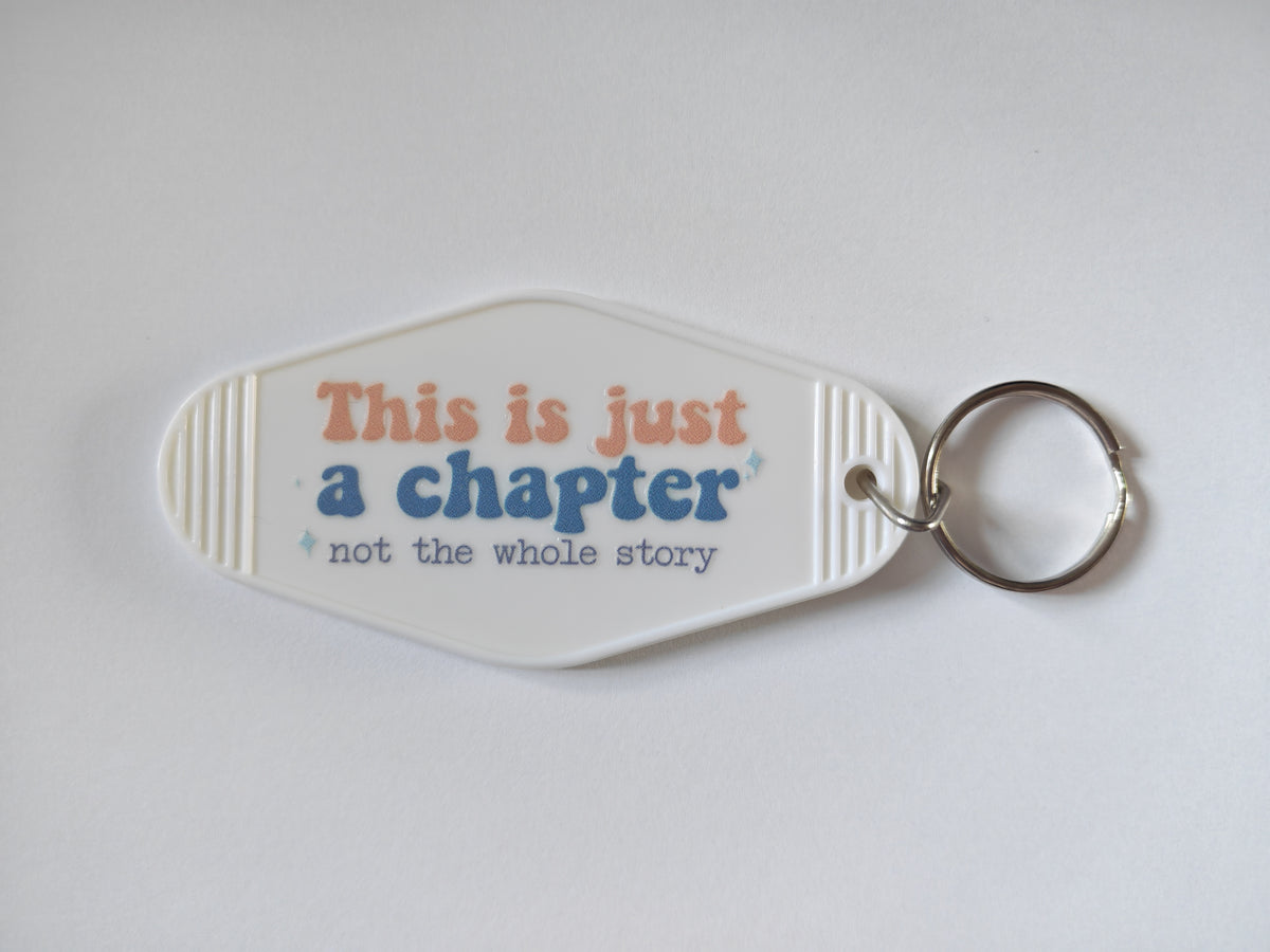 This Is Just A Chapter Motel Keychain - White