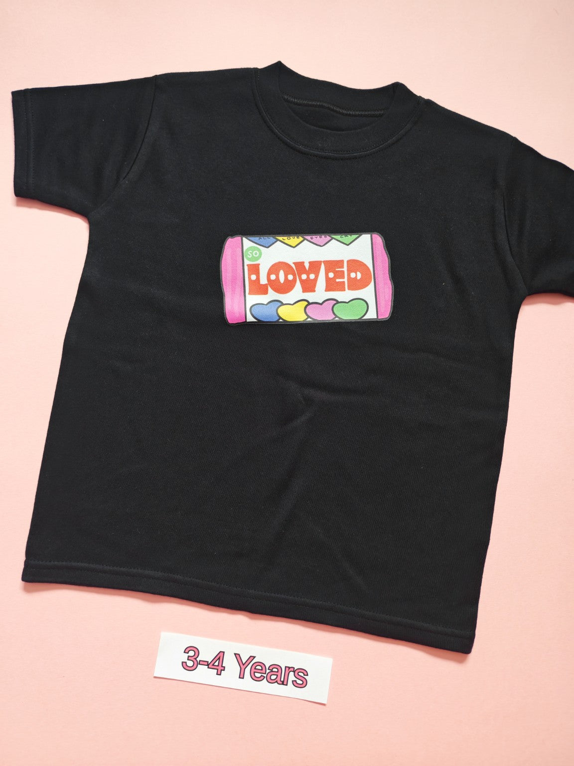 Black children's T-shirt with colourful So Loved design, size 3-4 years