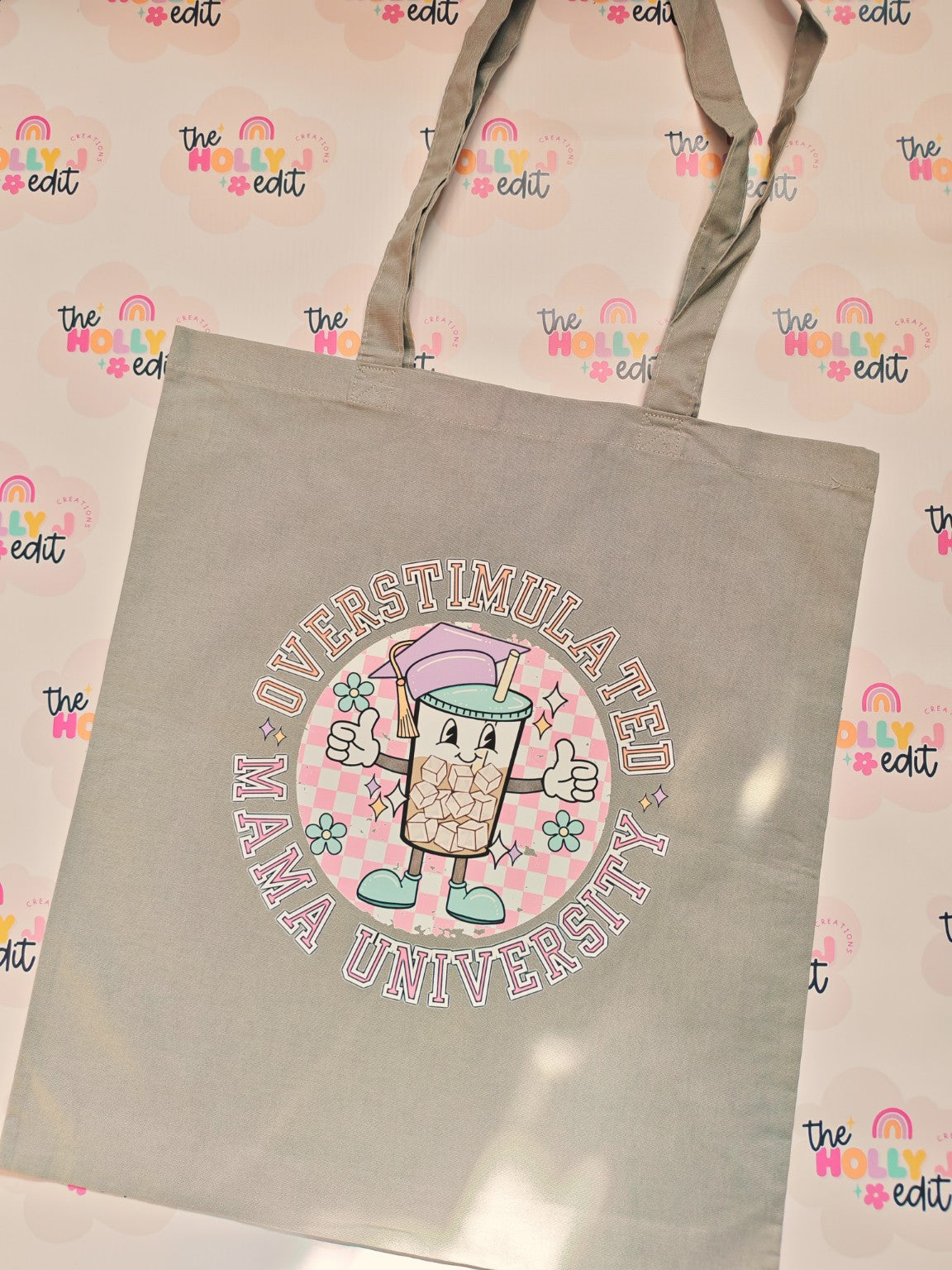 Grey tote bag with colourful Universal Mathematics design